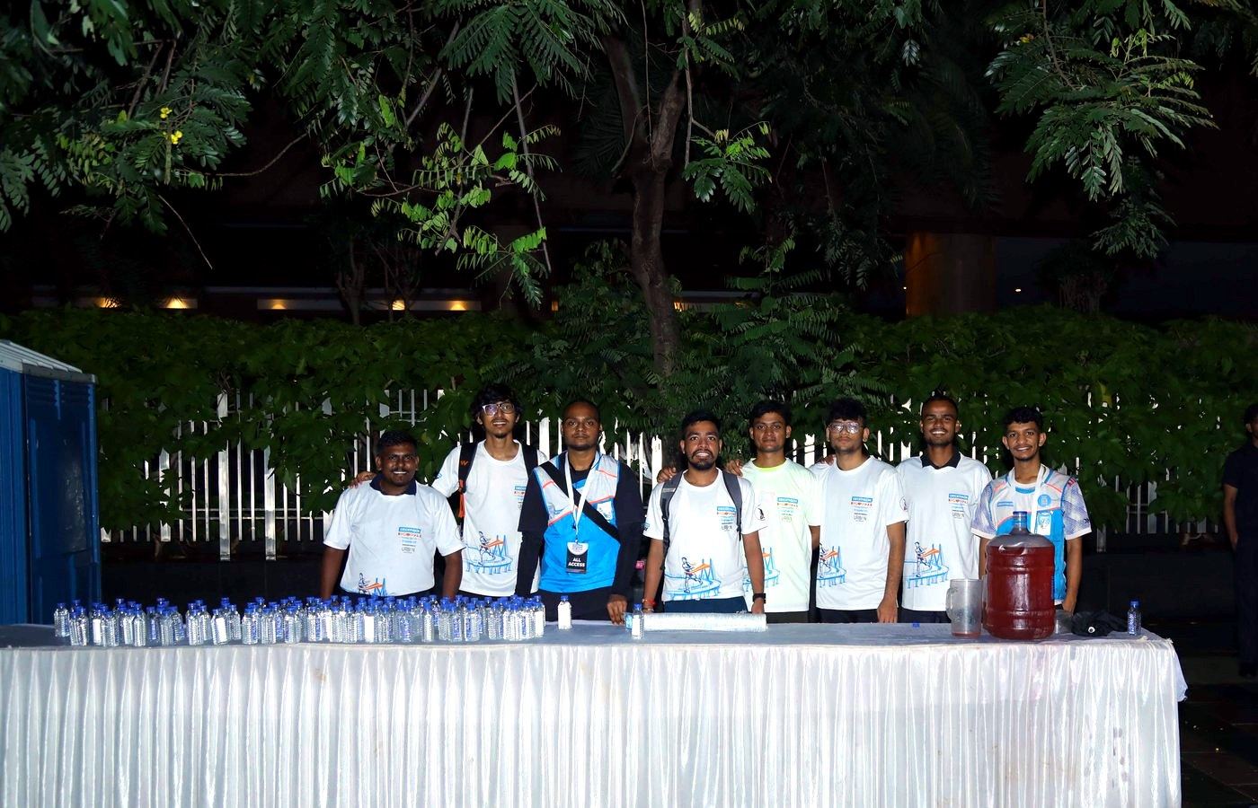 Abunduntia crew at a race-day hydration point before dawn